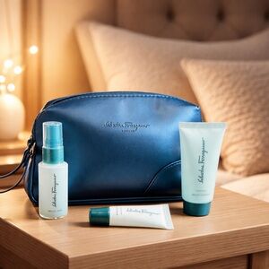 Salvatore Ferragamo Navy Blue mens travel bag with 3 little lotions travel size
